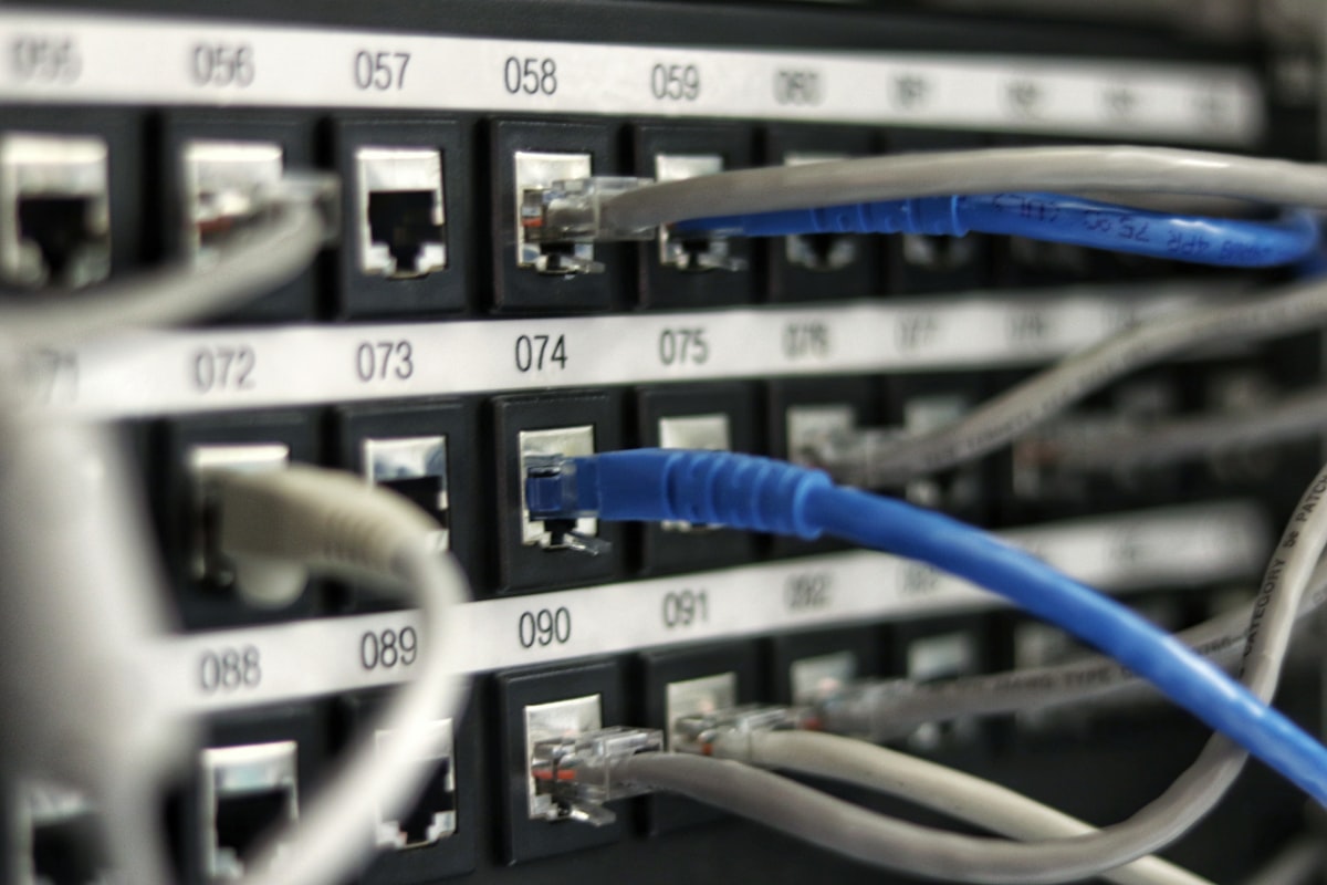 Server racks lit in cool blue light